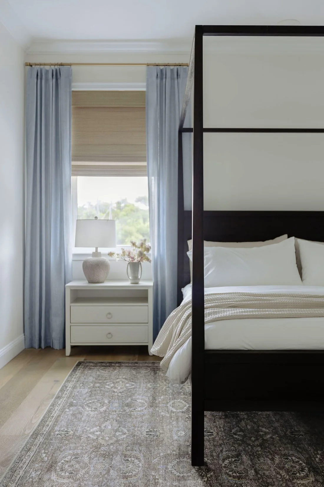 Styled bedroom in a small Airbnb apartment